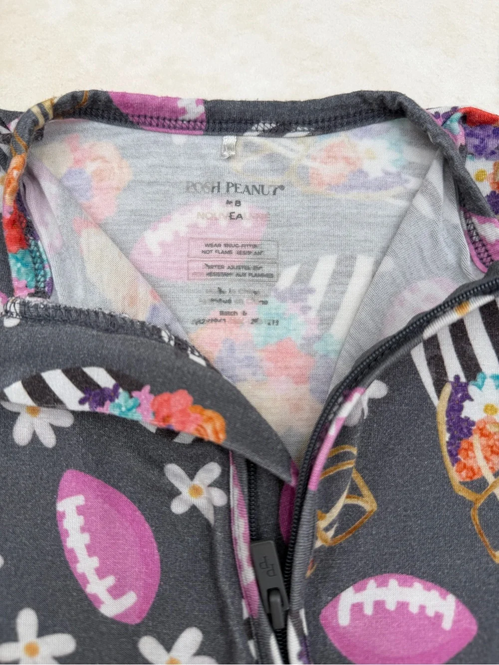 Posh Peanut Charcoal Floral Football Zip One-Piece